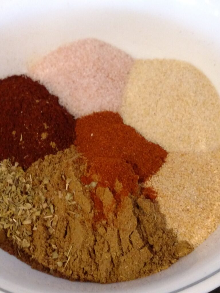 ingredients for homemade taco seasoning in a bowl