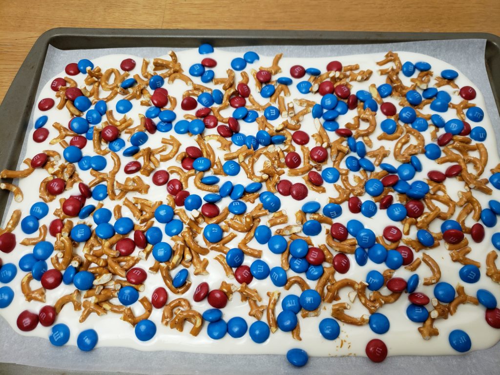 M&M's and pretzel pieces on melted bark