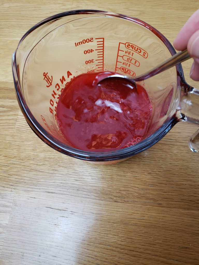 stirring red jell-o