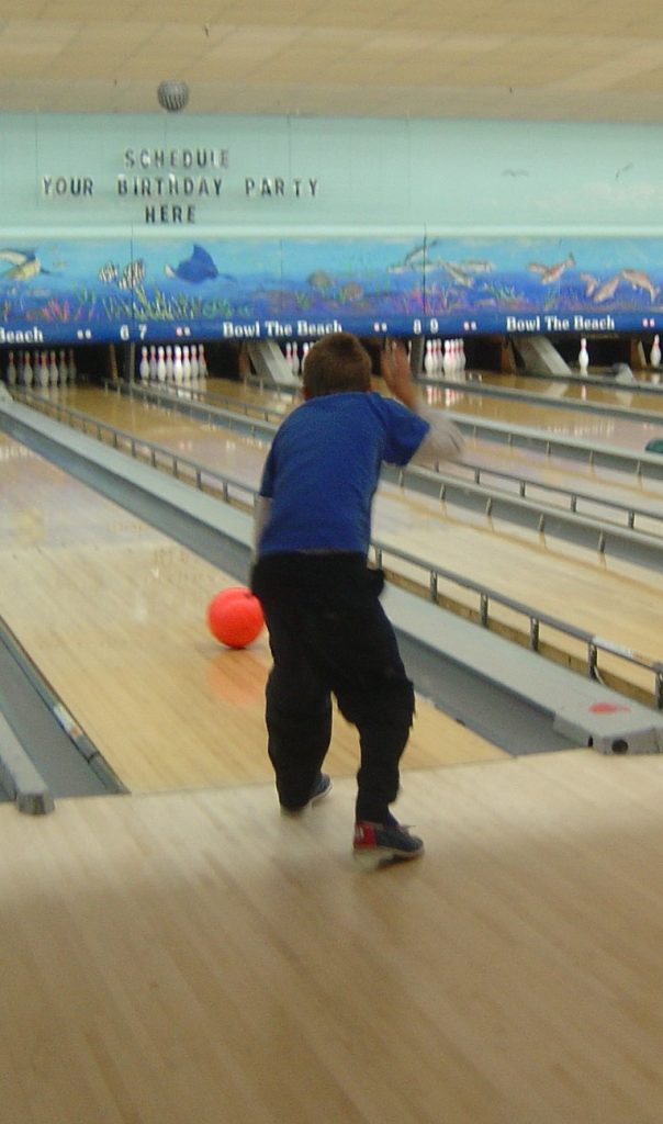 a boy bowling