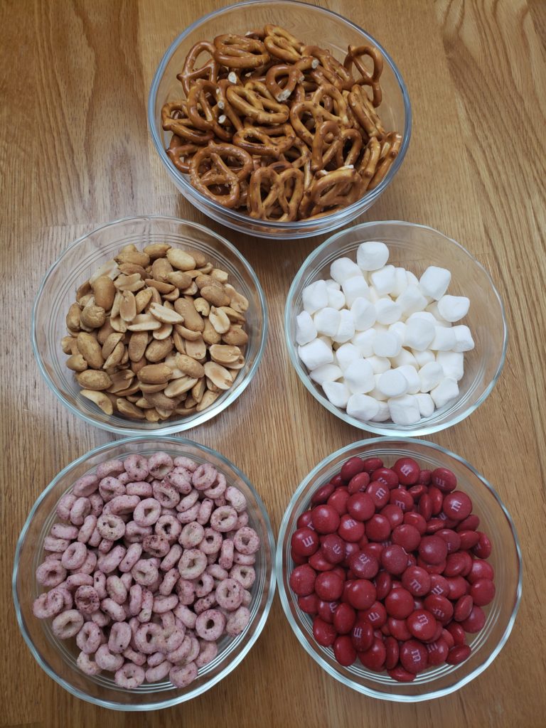 ingredients for Valentine’s Day Trail Mix in individual bowls