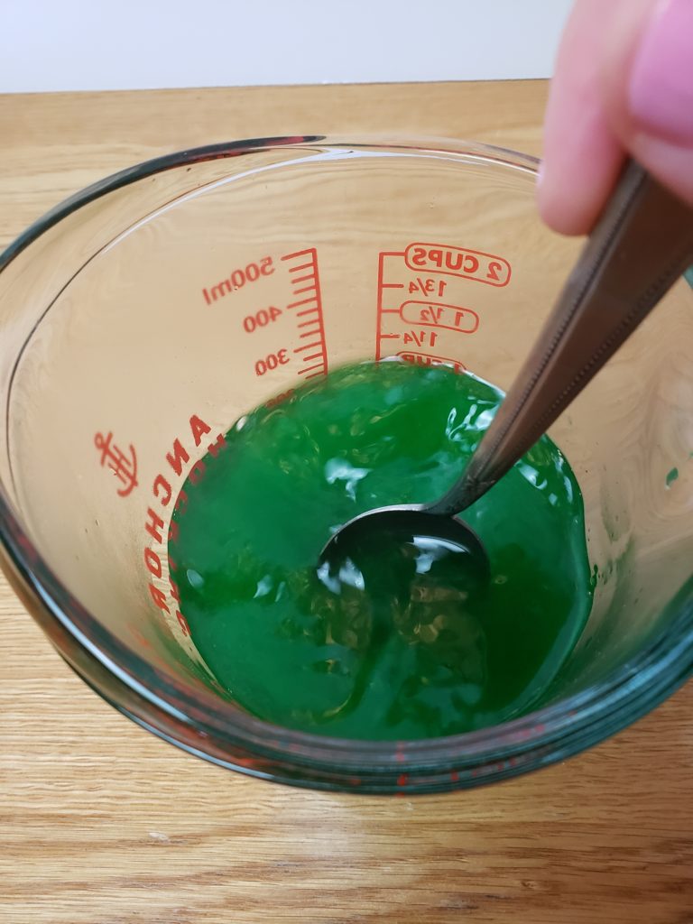 stirring green jello