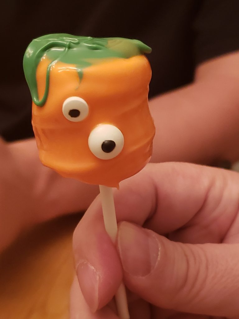 an orange Halloween Monster Marshmallow Pop