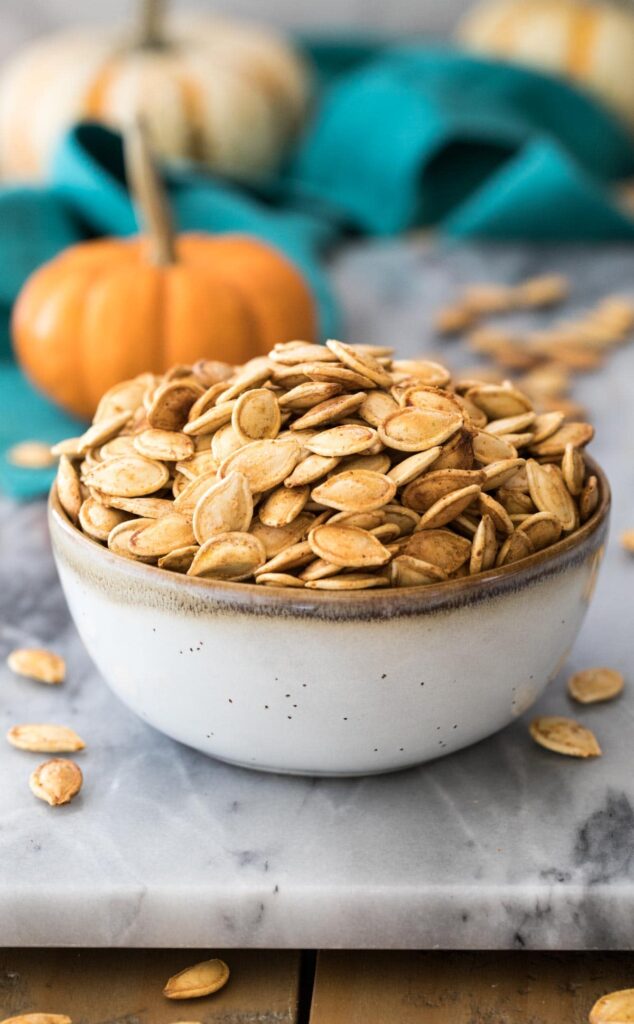 Roasted-pumpkin-seeds in white bowl