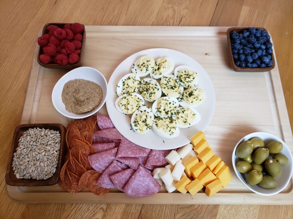 assembling low carb charcuterie board