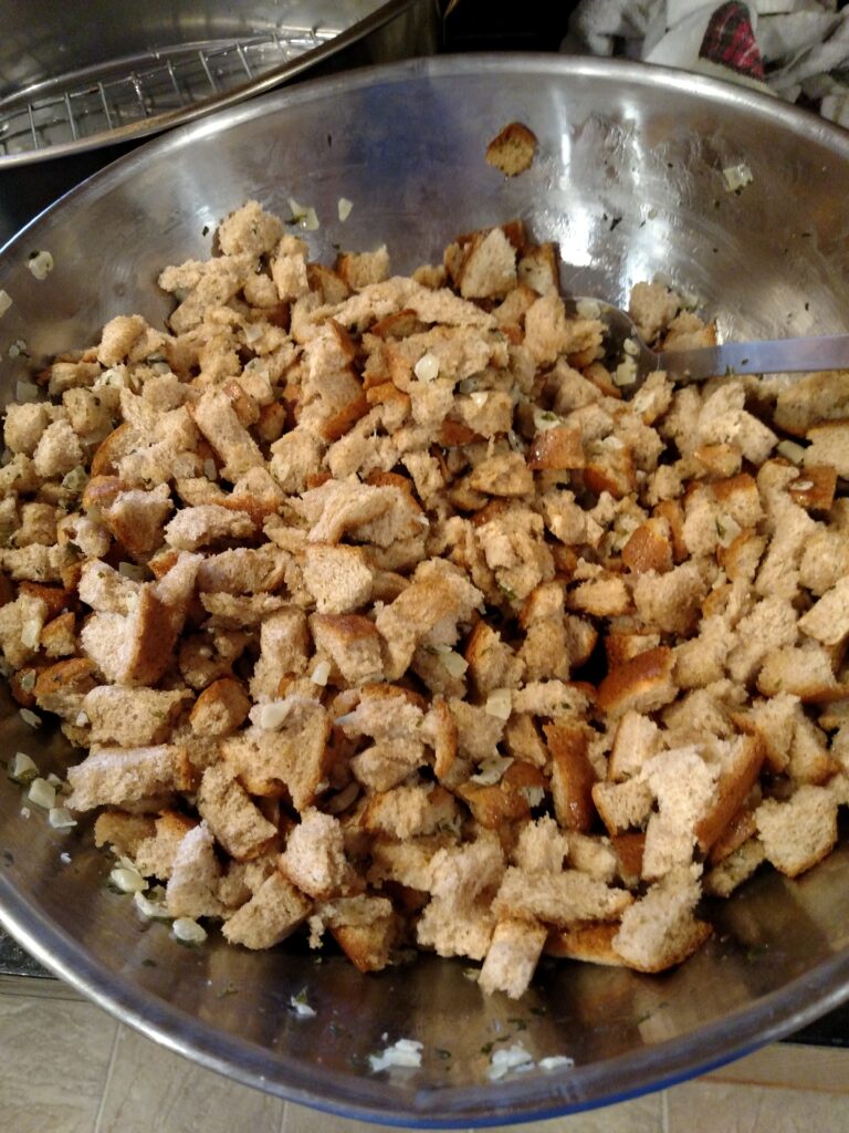 uncooked stuffing ready to go into turkey