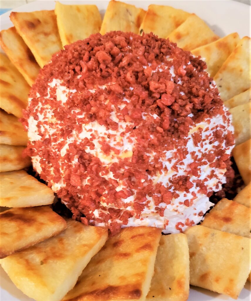 Cream Cheese Ball with crackers around it