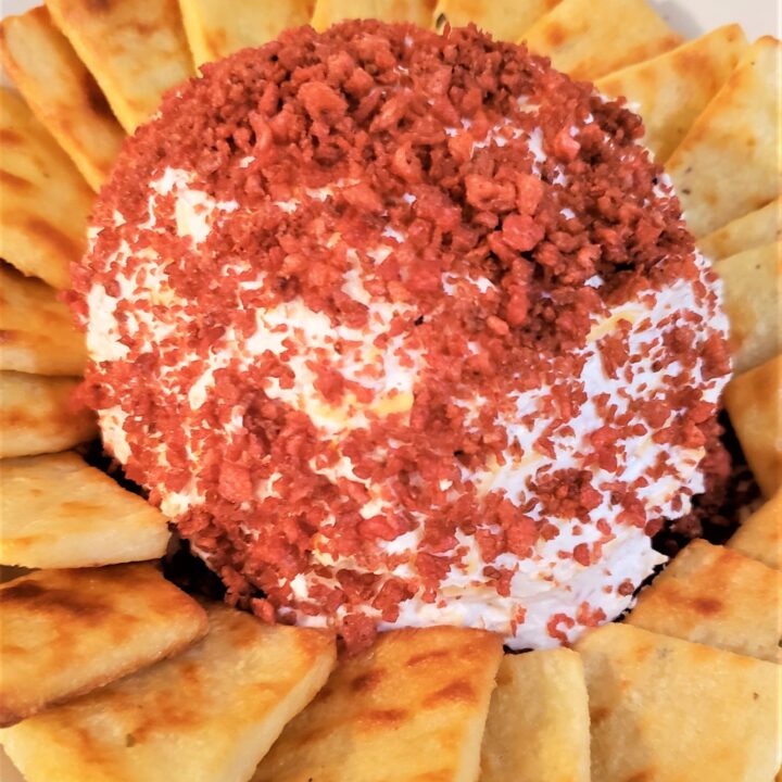 Cream Cheese Ball with crackers around it