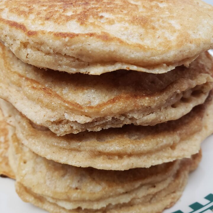 stack of 4 Brown Sugar Oatmeal Pancakes on a plate.