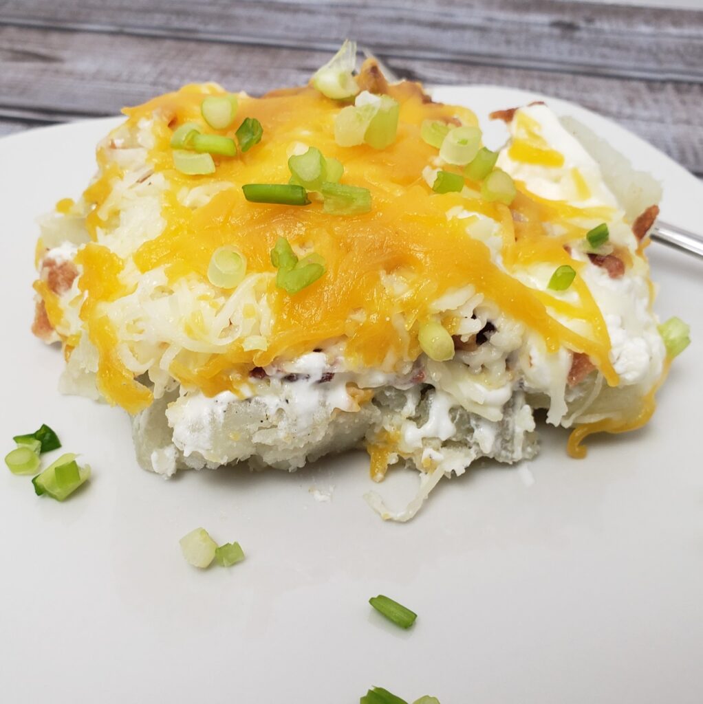 a serving of Twice Baked Potato Casserole on a plate.