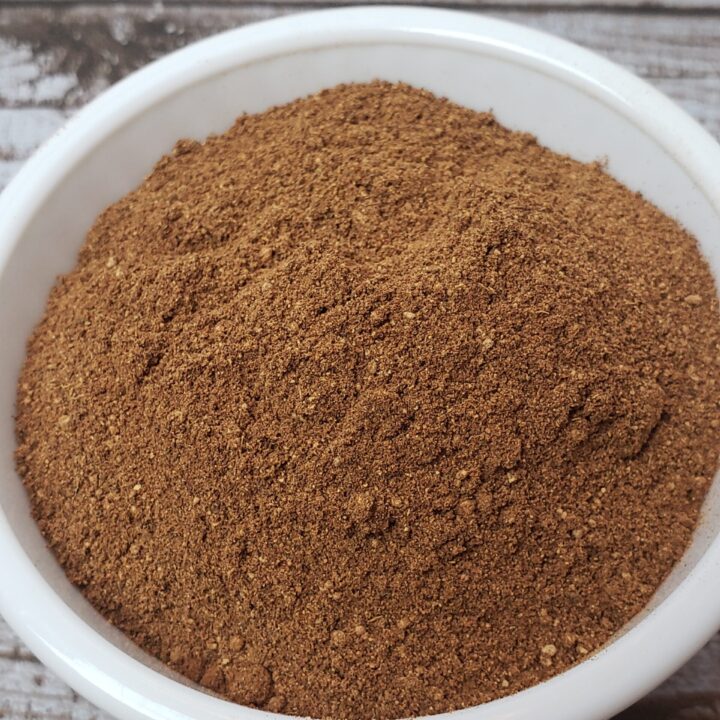 Homemade Pumpkin Pie Spice in white bowl.