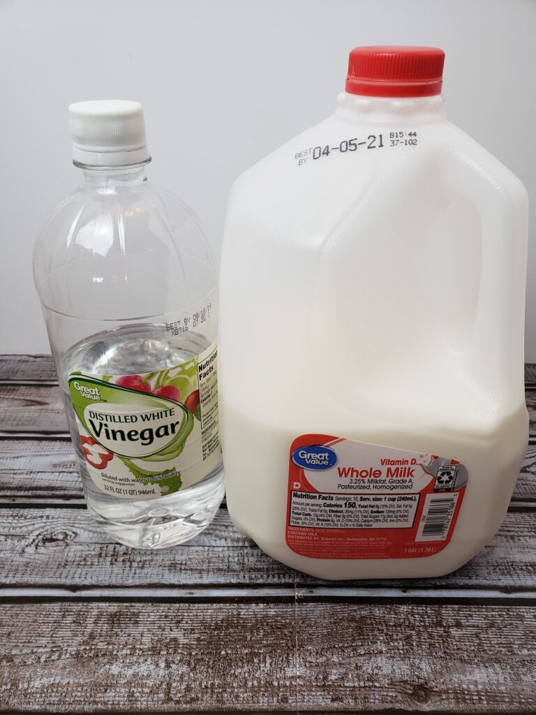 bottles of vinegar and milk out to make buttermilk.