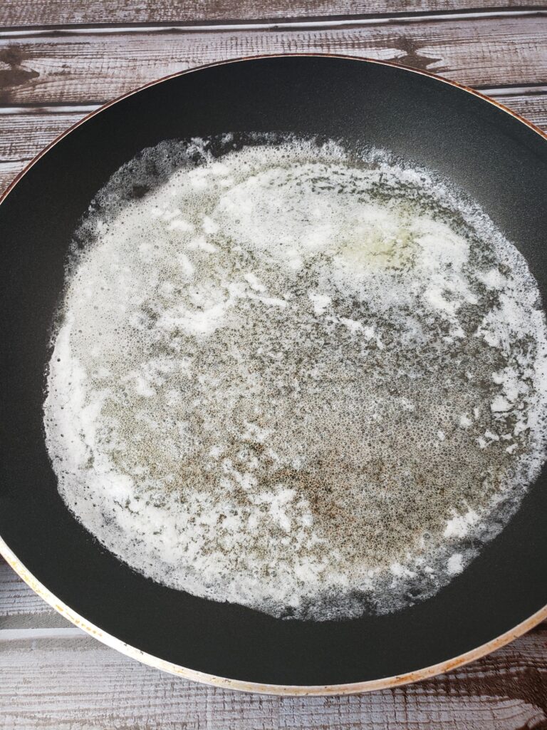 melted butter in pan