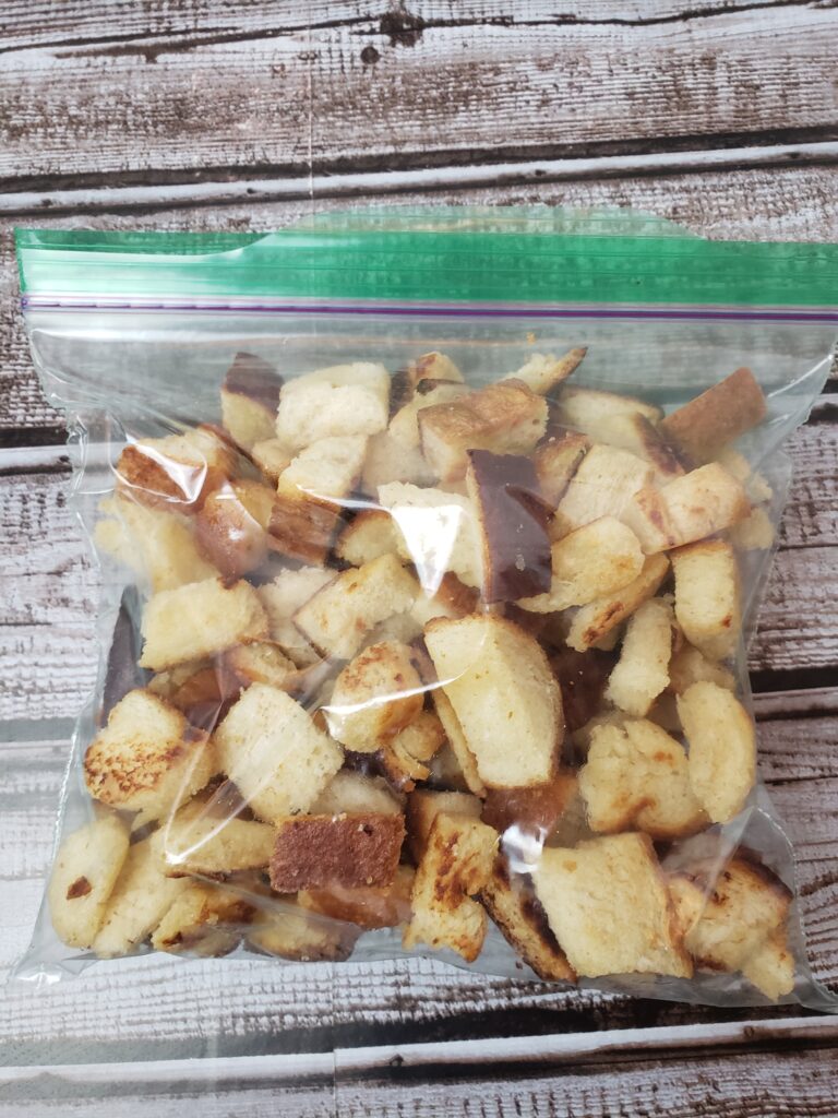 toasted bread cubes in Ziploc bag