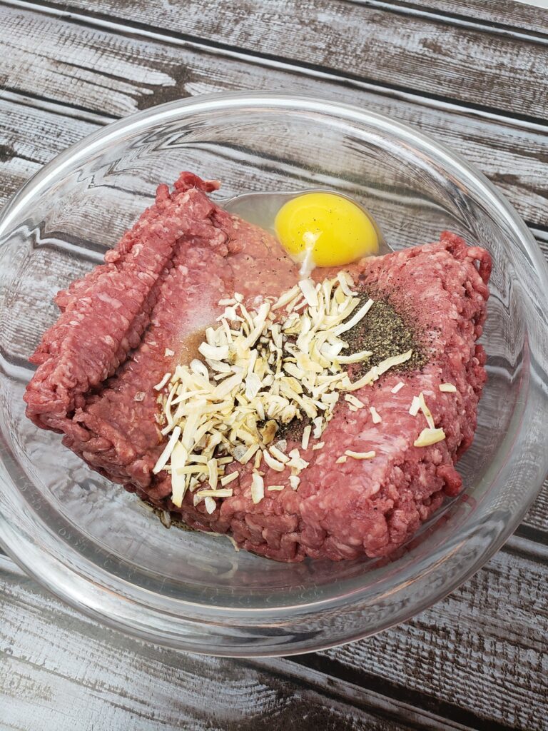 ingredients for Simple Recipe for Hamburgers in mixing bowl