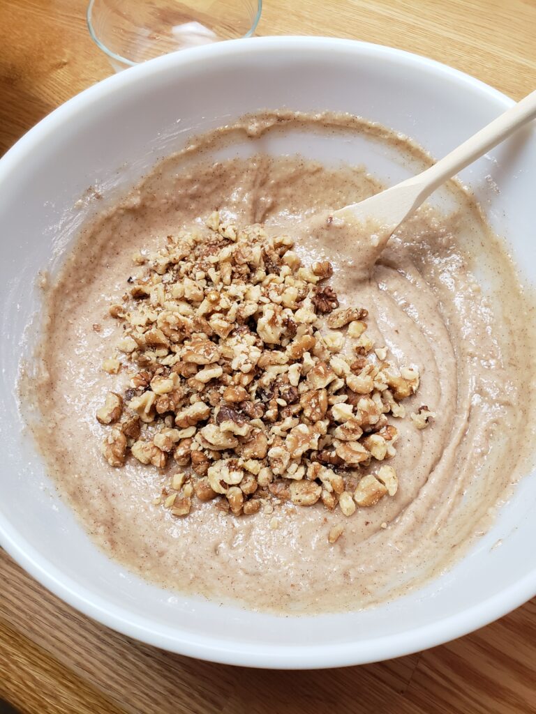 chopped walnuts added to muffin batter.