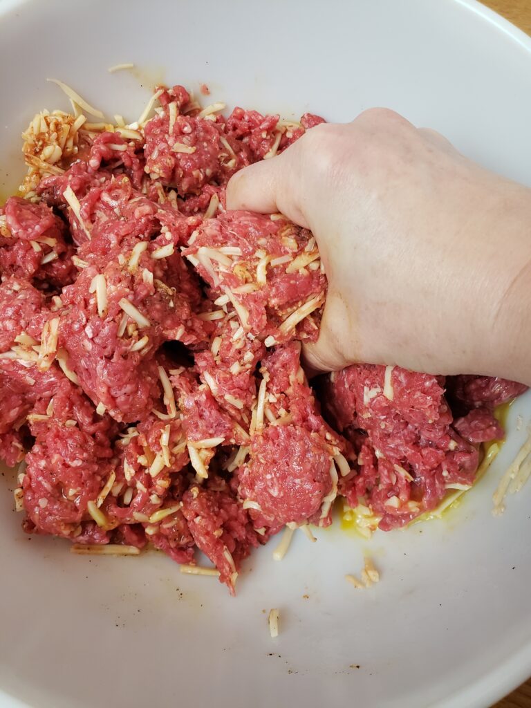 mixing meatloaf up by hand