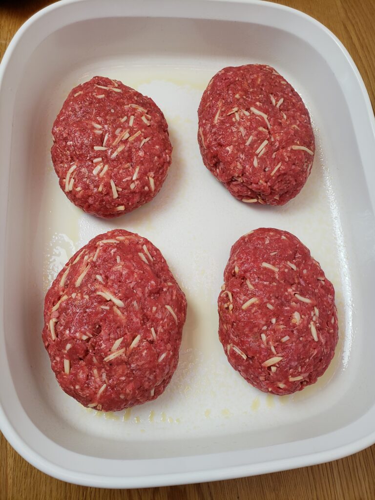 meatloaf mixture made into four neat loaves