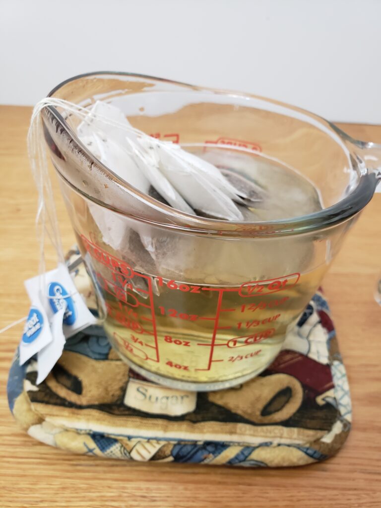 tea bags added to boiling water.