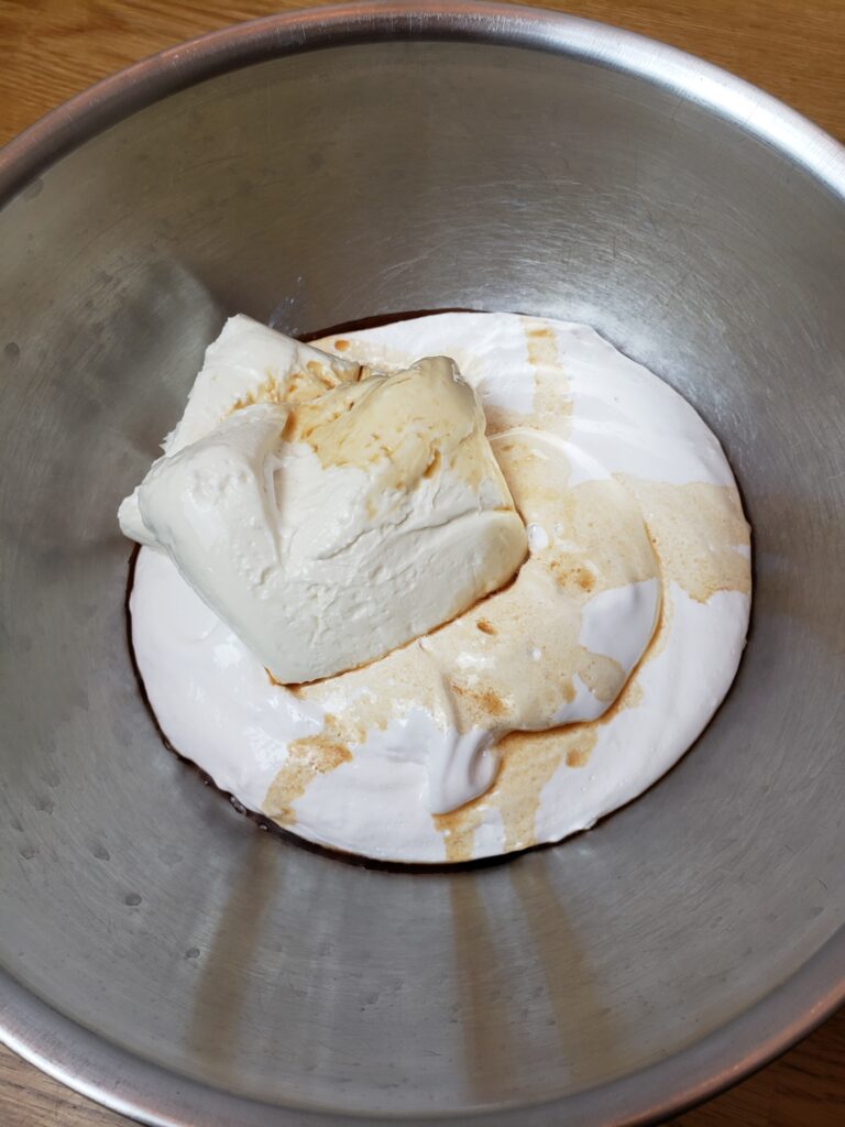 all ingredients for easy fruit dip in a mixing bowl.