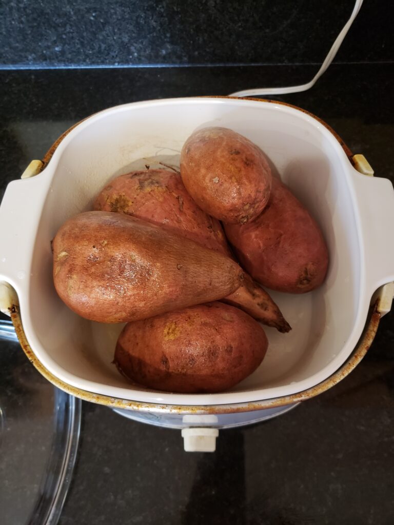 5 sweet potatoes in a crock pot.