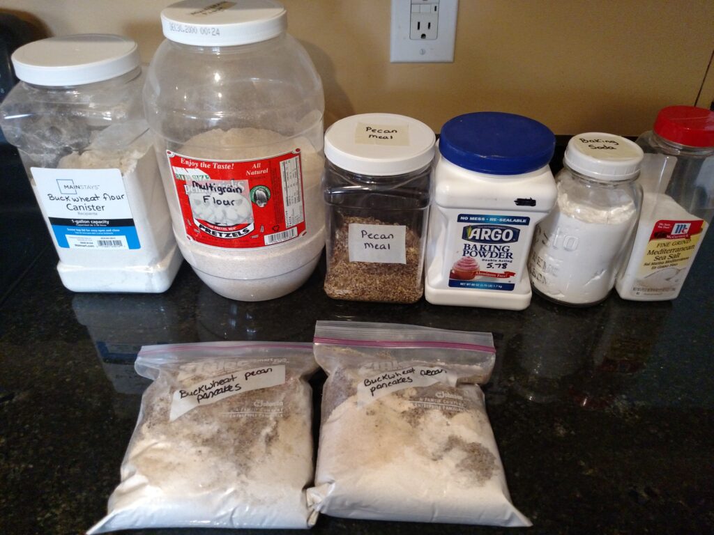 dry ingredients for Buckwheat Almond Pancakes and 2 bags of mix made up