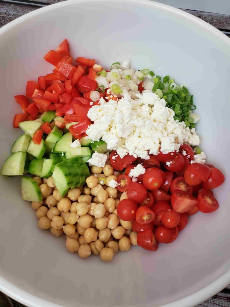 chickpea salad ingredients in bowl