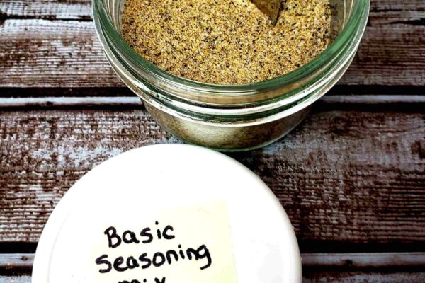 Basic Seasoning Mix basic seasoning mix in small jar with a spoon