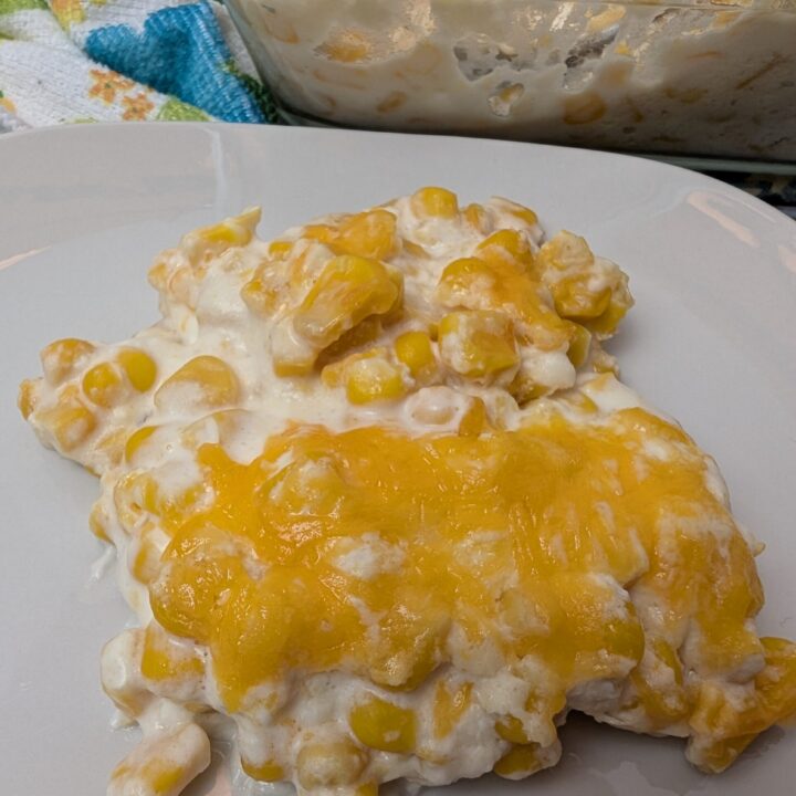 Cheesy Corn Casserole on white plate