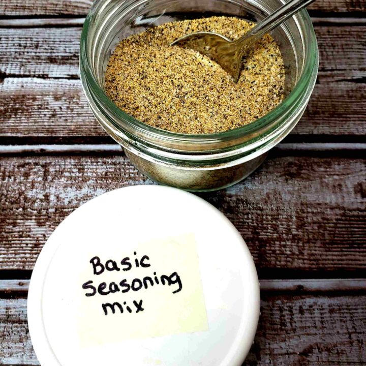 basic seasoning mix in small jar with a spoon