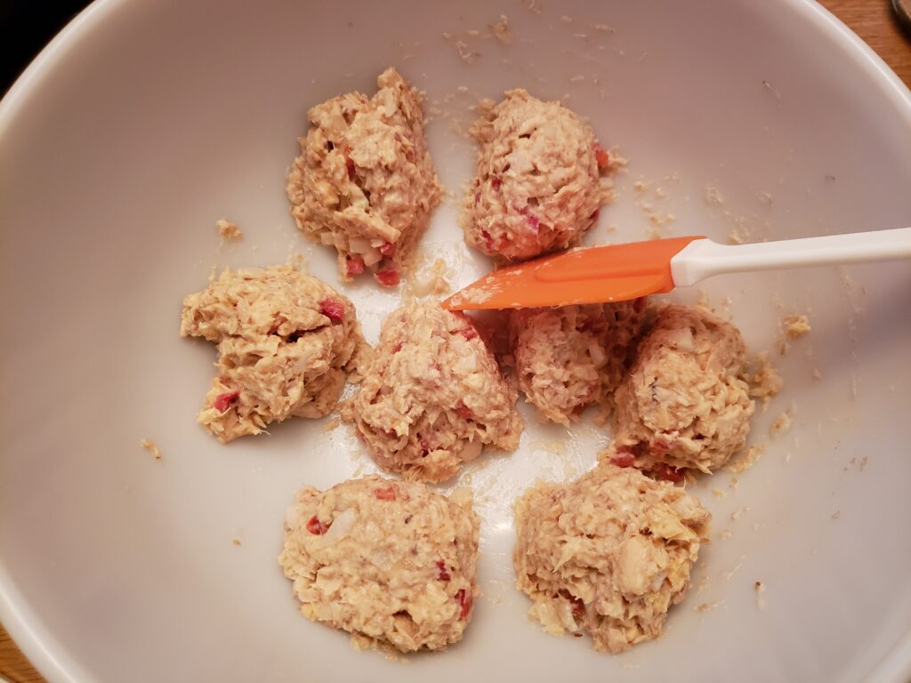 salmon cakes mixture divided into 8 cakes before being cooked