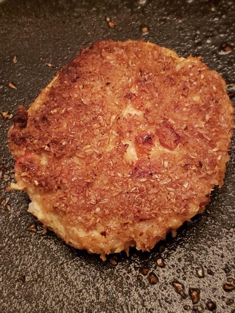 one perfectly fried gluten free salmon cake