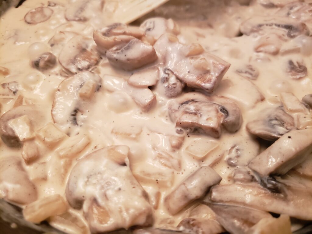 creamed mushrooms in skillet