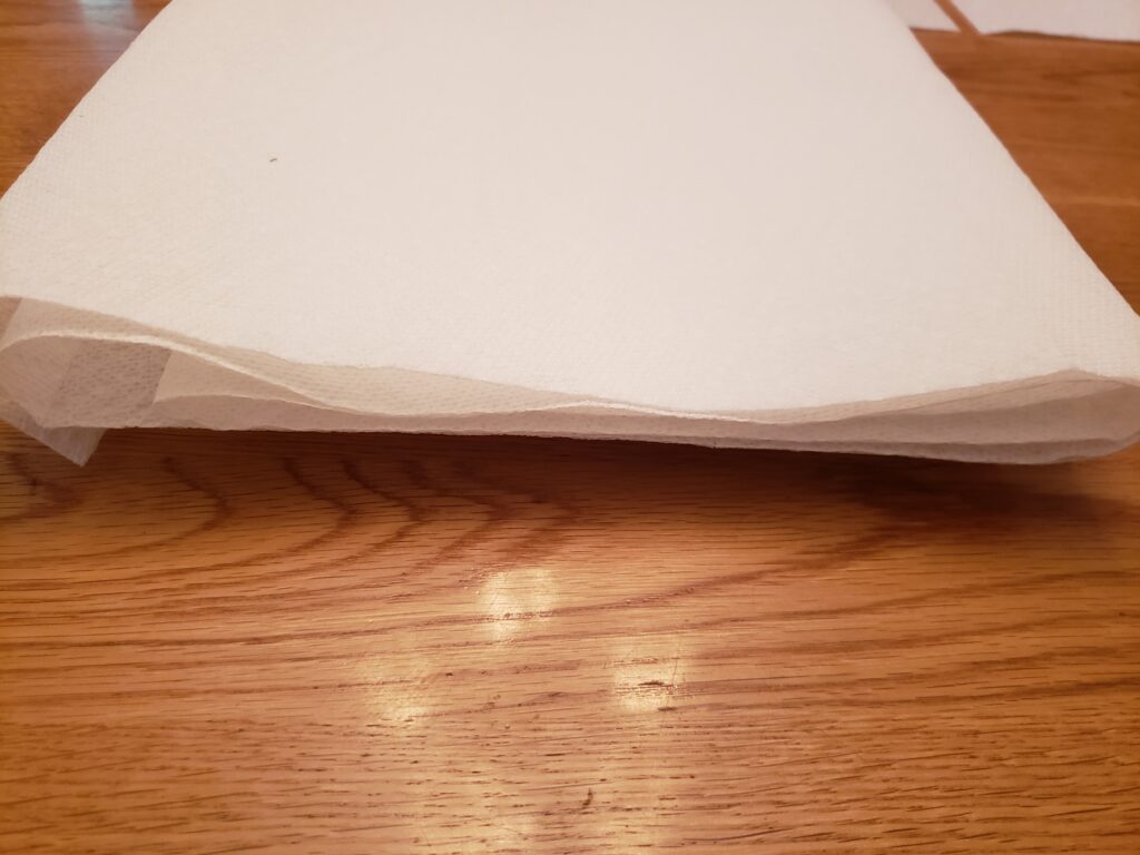 paper towels folded on a plate