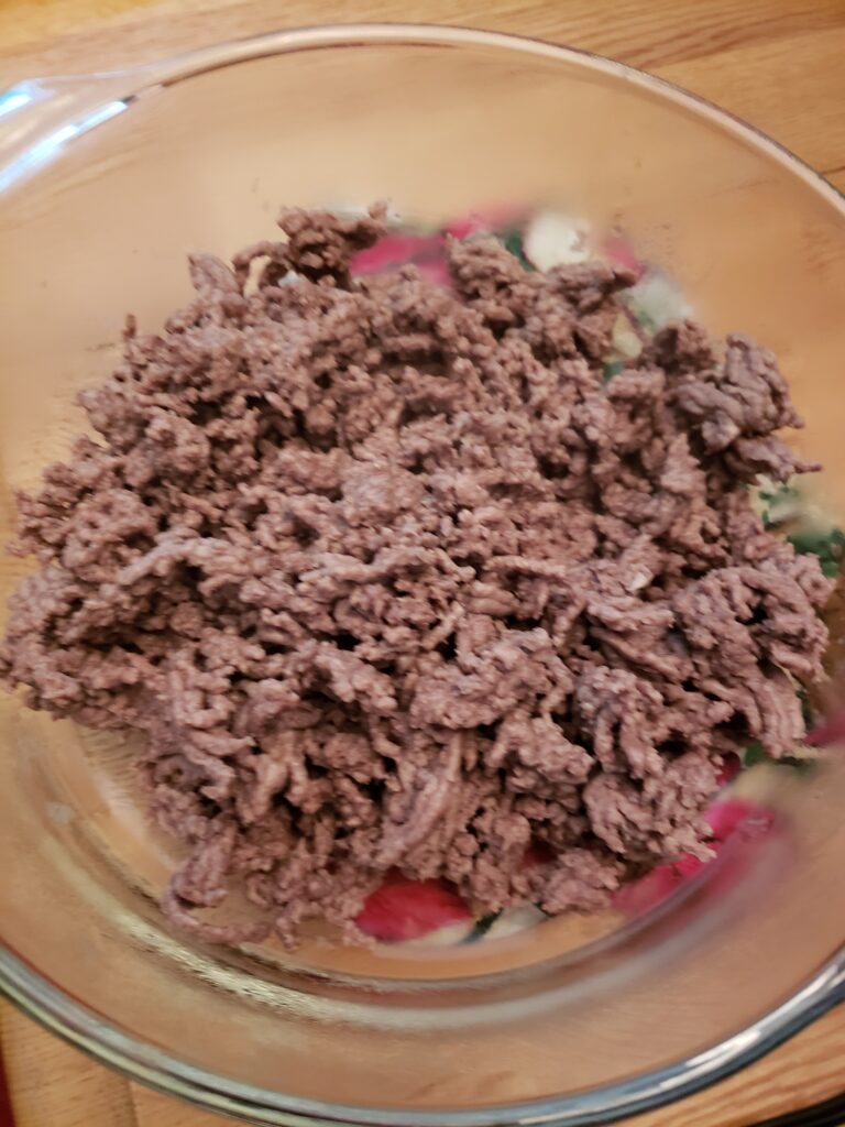 ground beef in glass bowl