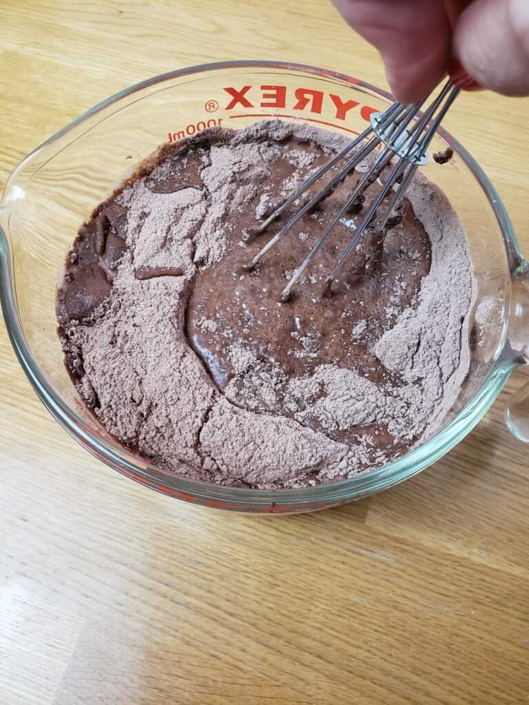 mixing milk and chocolate pudding mix