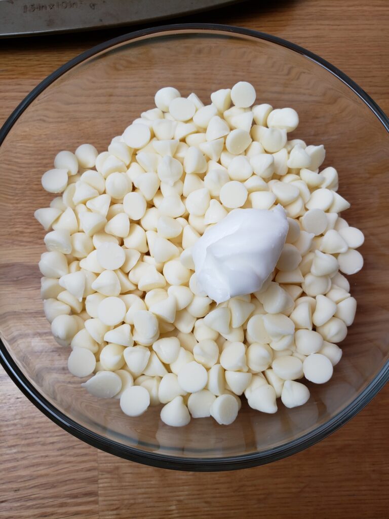 shortening and white chips in a glass bowl