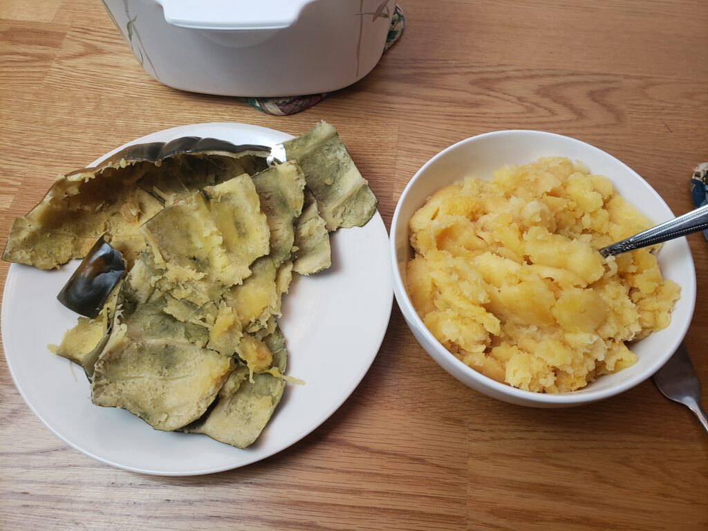 acorn squash in bowl on right and skin on plate on left