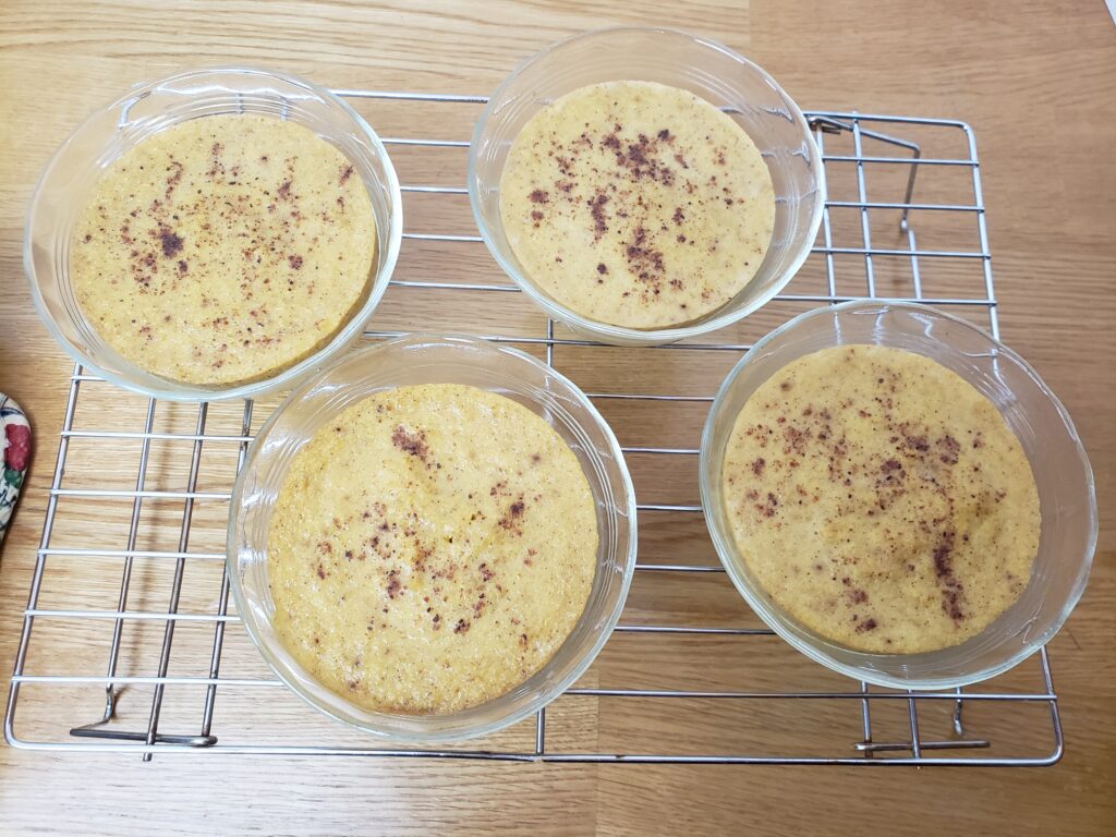 4 custards cooling on a cooling rack