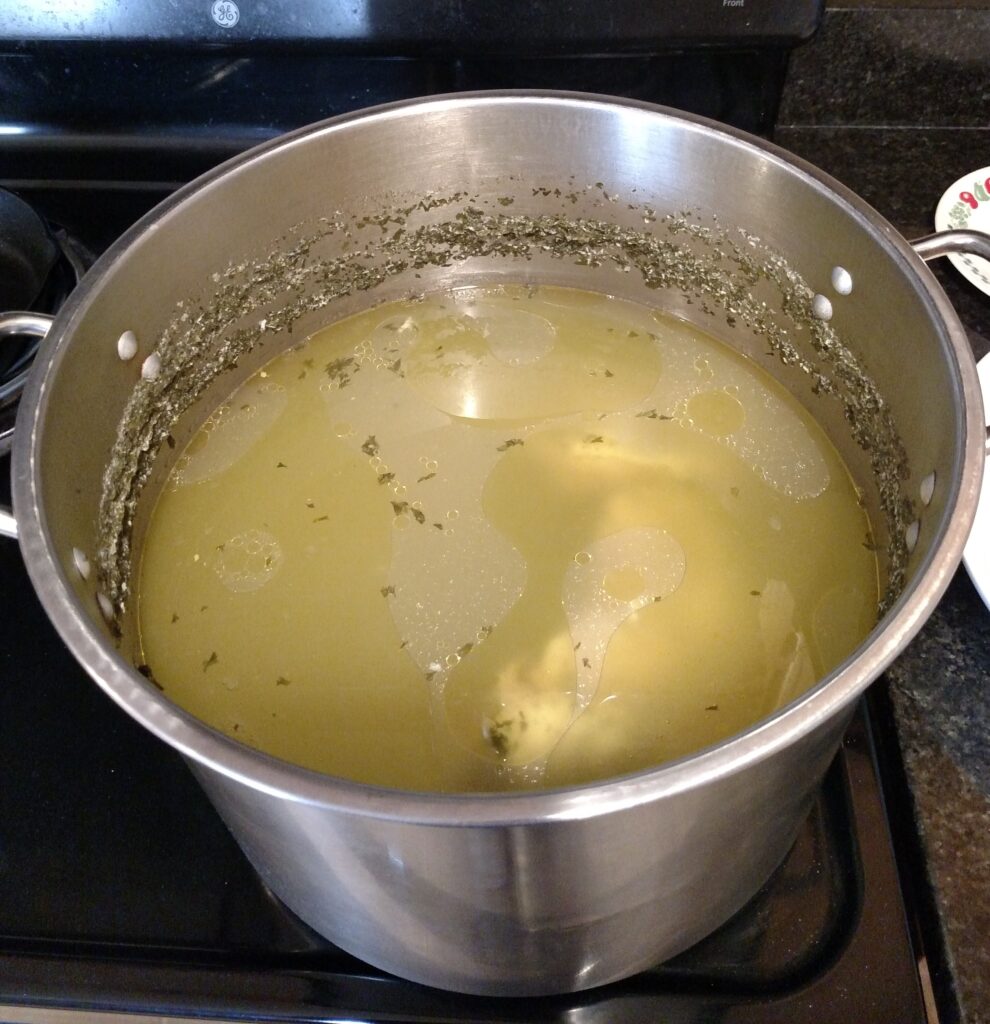 large pot of chicken broth