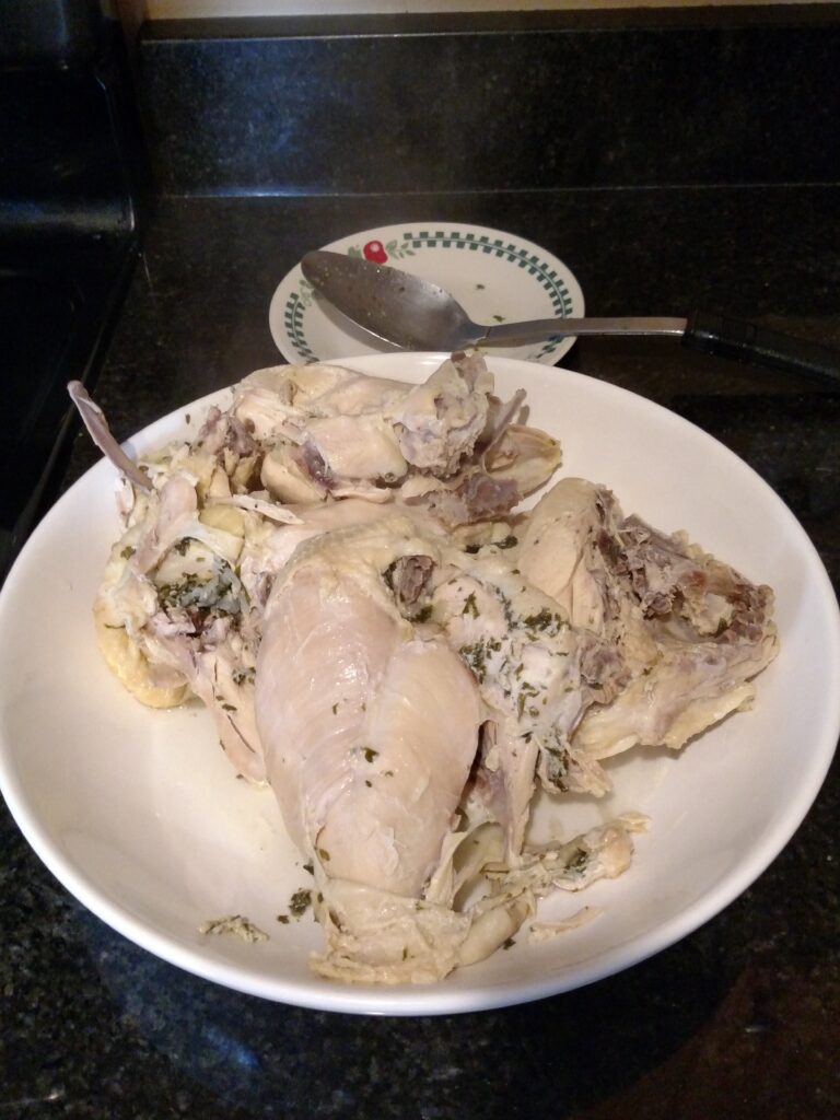 cooked chicken cooling on plate
