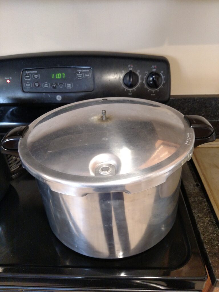 lid on canner and steam building