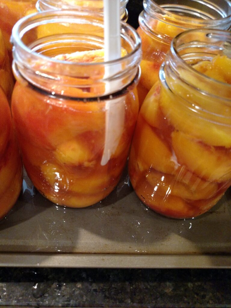 running plastic knife around edges of jar