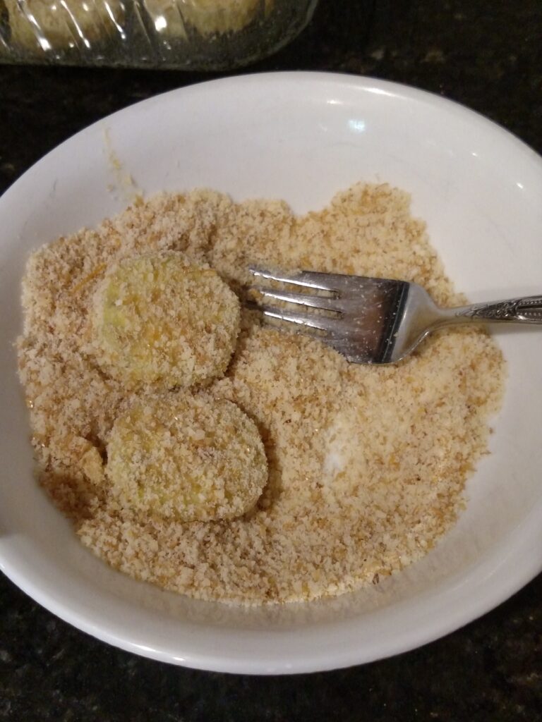 eggplant in bowl with breading