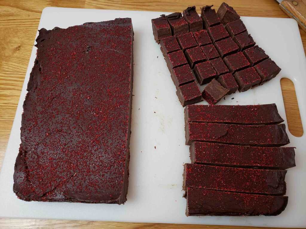 cutting dark chocolate raspberry fudge