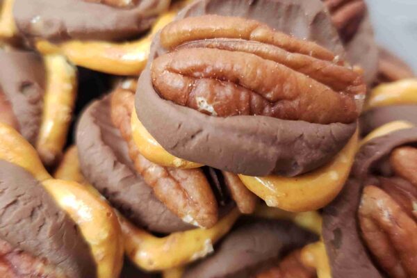 caramel pretzel turtles in glass bowl