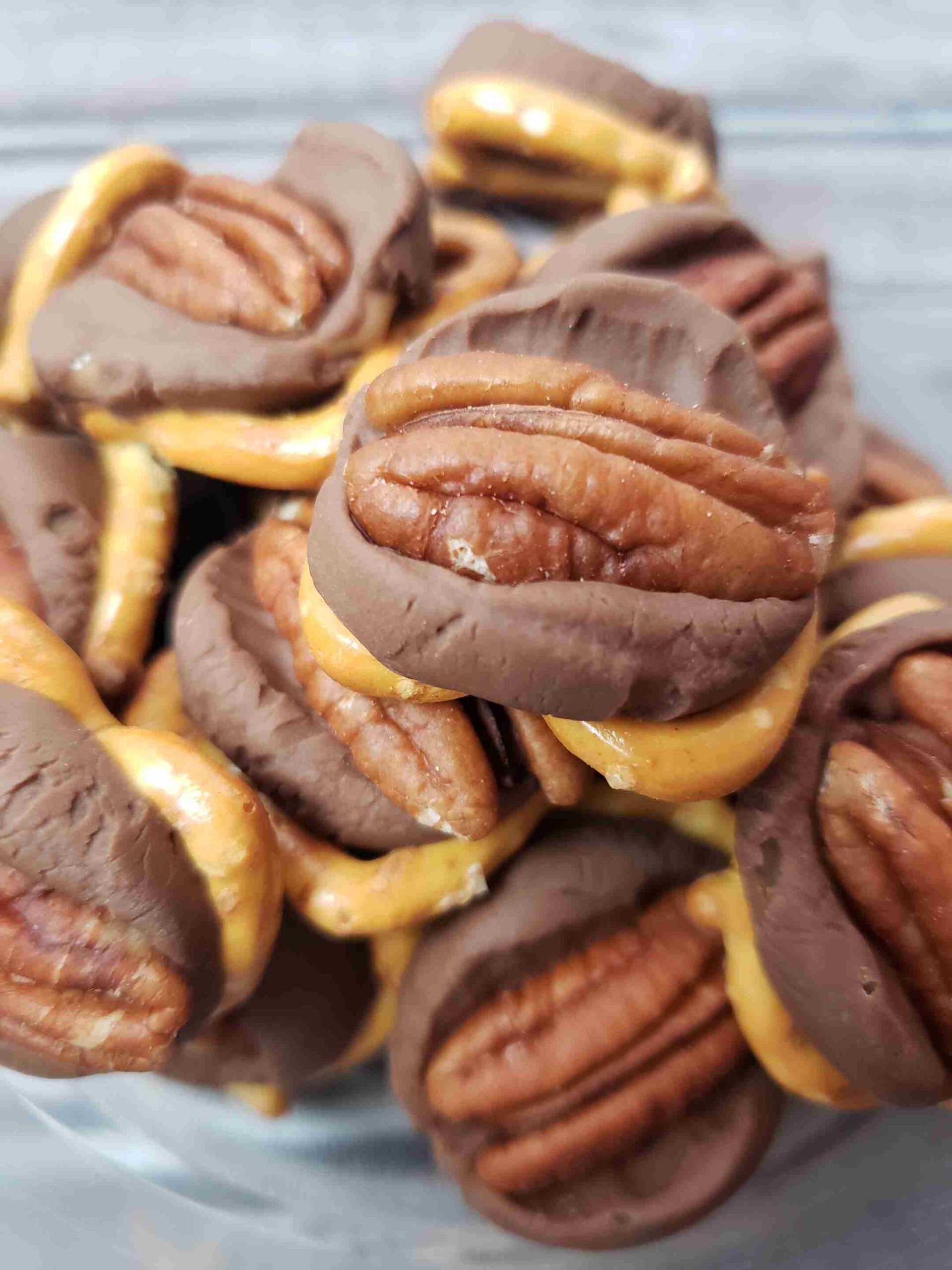 caramel pretzel turtles in glass bowl