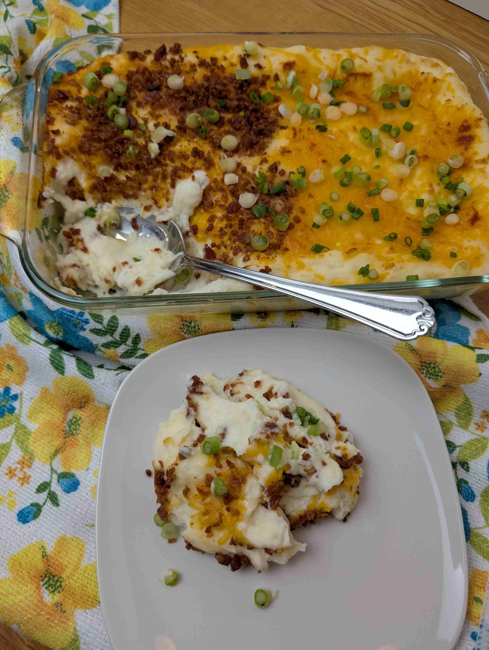 make ahead mashed potato casserole with a serving next to it