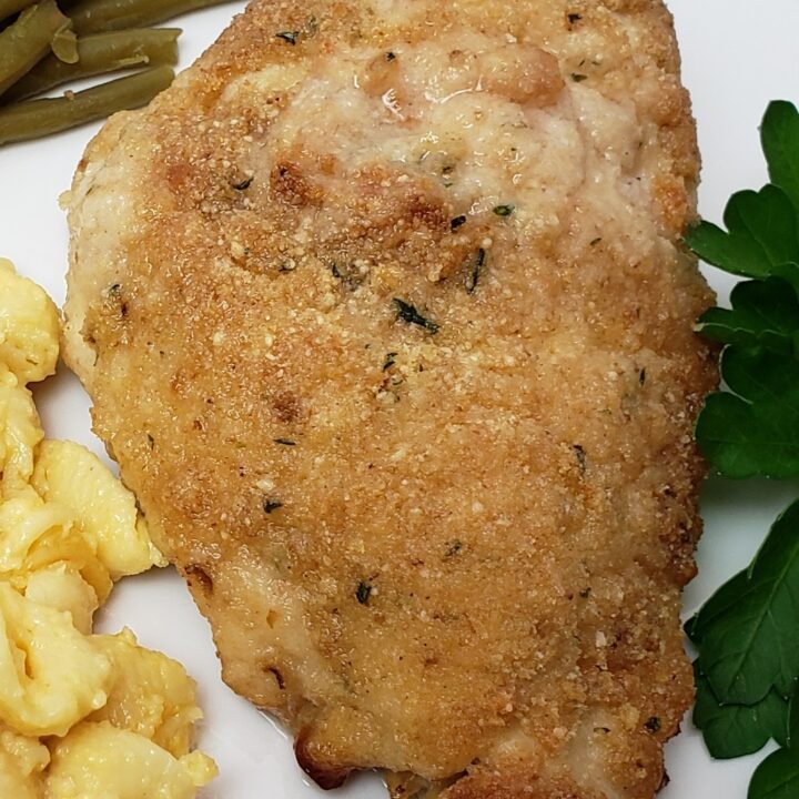 parmesan chicken on a white plate